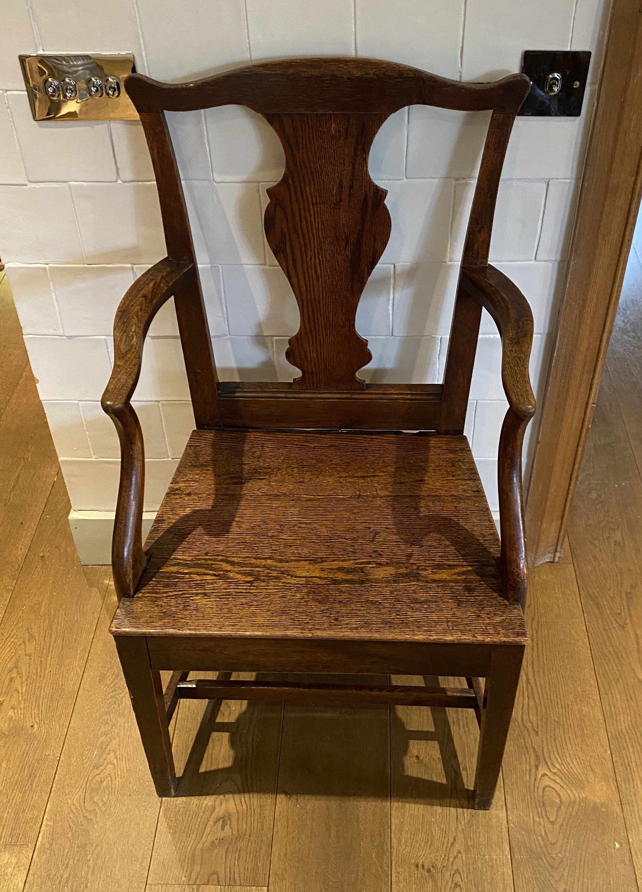 A George III oak cottage dining chair, with solid splat and seat
